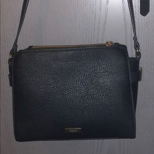New ALDO- black mini winged cross body bag
